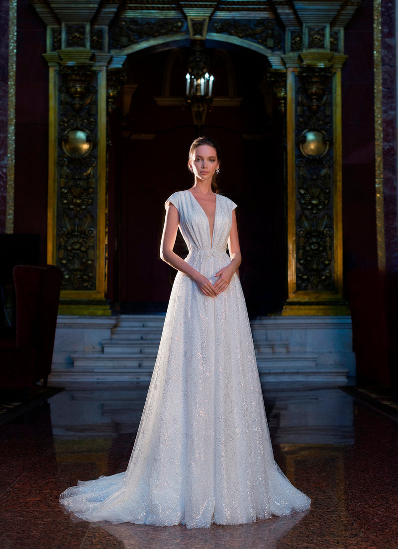 Vestido de novia con purpurina y manga japonesa