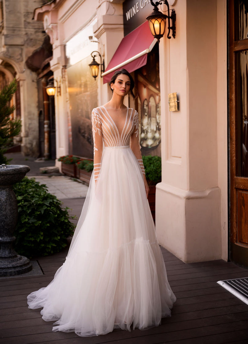 Vestido de noiva evasê de manga comprida