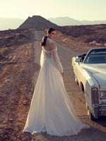 Vestido de novia sin tirantes con bolero