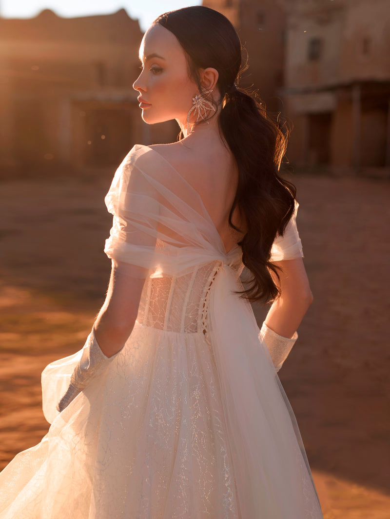 Vestido de novia de princesa con hombros descubiertos