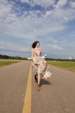 Vestido largo con estampado de flores y cuello alto