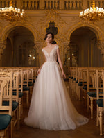 Robe de mariée trapèze glamour à paillettes et col en V