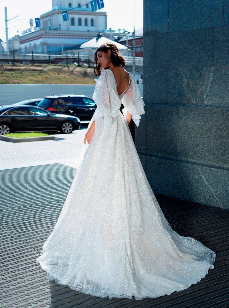 Robe de mariée corset à paillettes avec manches amovibles