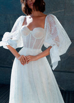 Vestido de noiva espartilho brilhante com mangas removíveis