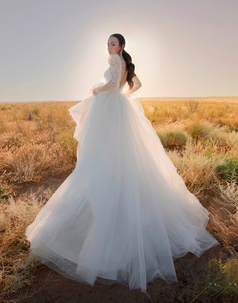 Robe de mariée trapèze transparente à manches longues