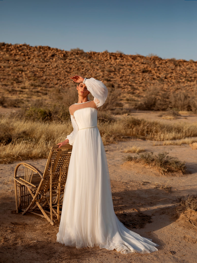 Robe de mariée élégante à manches bouffantes de style minimaliste