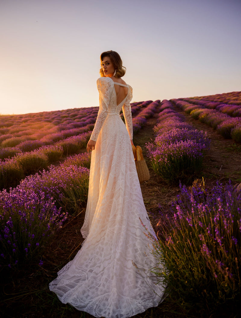 Robe de mariée en dentelle avec boléro