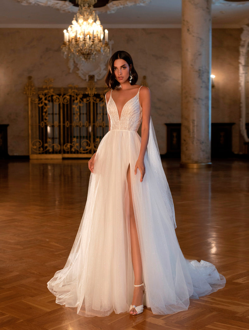 Vestido de novia evasé con alas de ángel