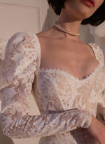 Vestido de novia de encaje de manga larga
