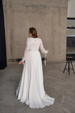 Robe de mariée trapèze à manches longues