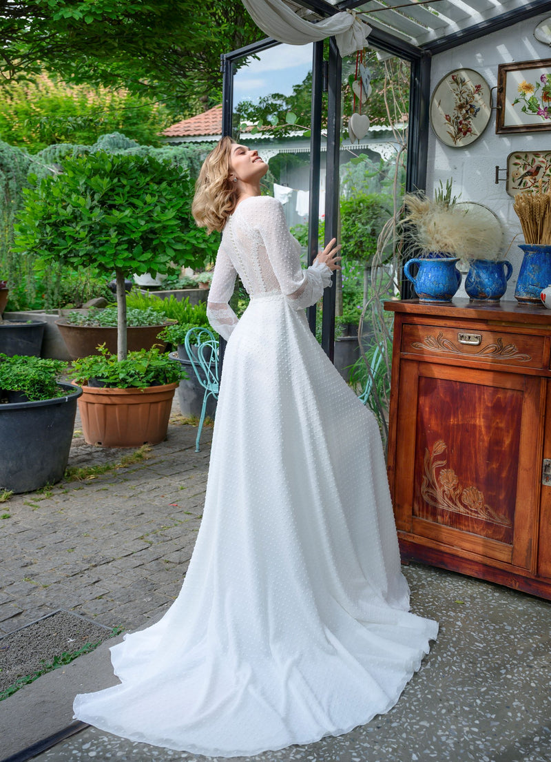 Robe de mariée trapèze à manches longues