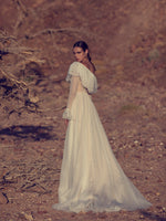 Vestido de novia de corte sirena con escote asimétrico