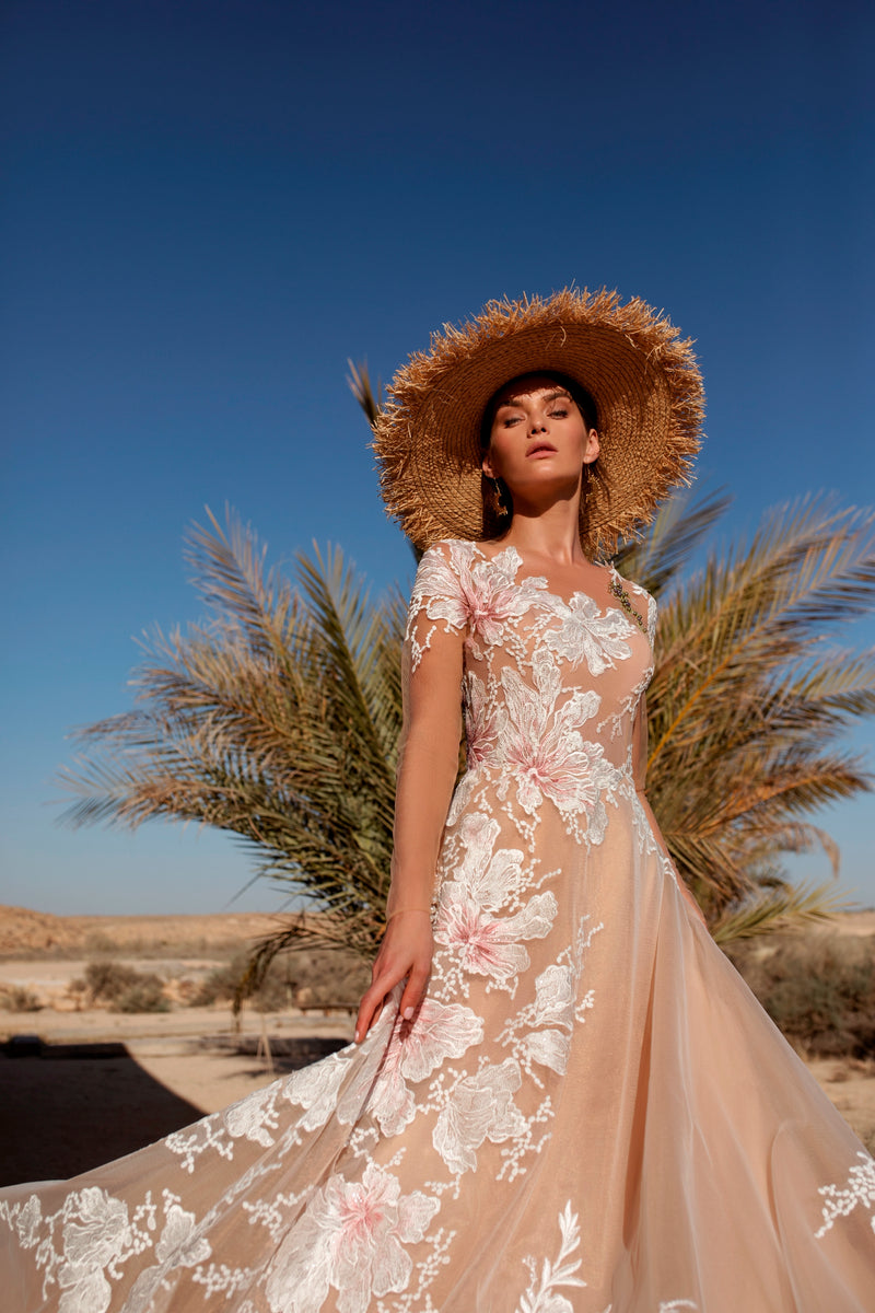 Vestido con estampado floral y mangas ilusión