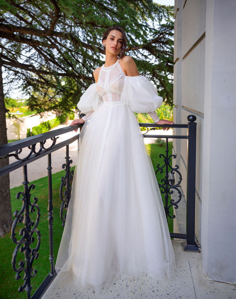 Robe de mariée à manches bouffantes 