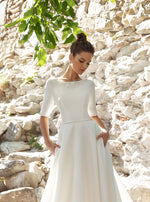 Elegante vestido de novia minimalista de corte A en mikado