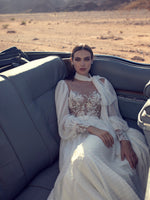 Vestido de noiva de manga comprida de bolinhas