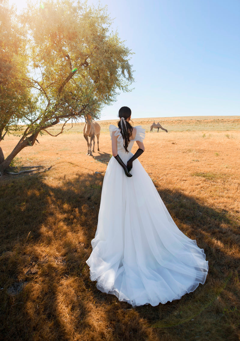 Robe de mariée trapèze minimaliste