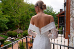 Robe de mariée sirène intemporelle en dentelle à épaules dénudées