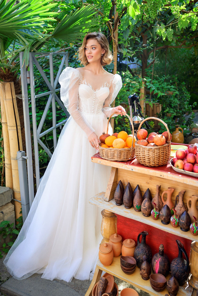 Vestido de novia de manga larga con vestido de gala