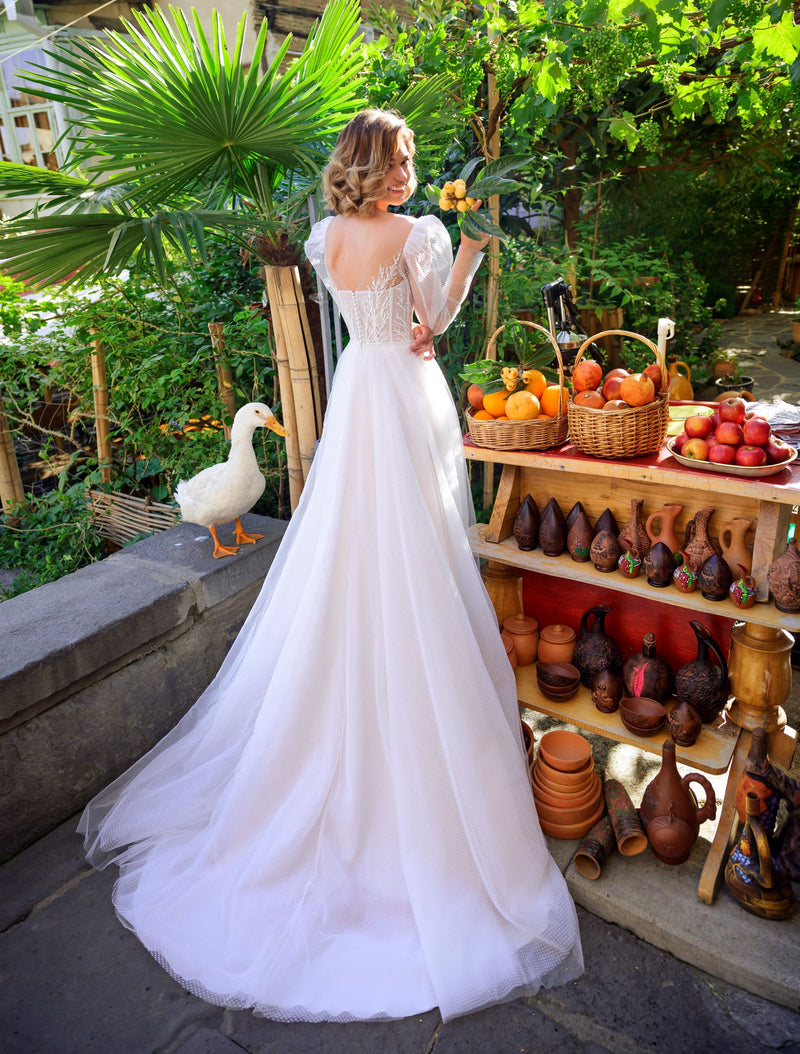 Vestido de novia de manga larga con vestido de gala