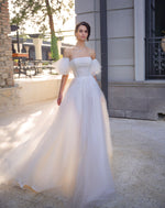 Robe de mariée sans bretelles à paillettes avec manches courtes bouffantes amovibles 