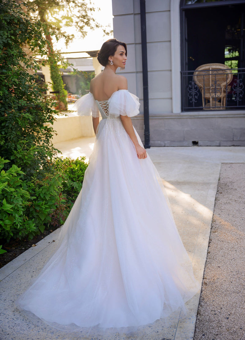 Robe de mariée sans bretelles à paillettes avec manches courtes bouffantes amovibles 