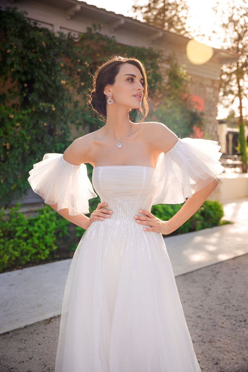 Robe de mariée sans bretelles à paillettes avec manches courtes bouffantes amovibles 